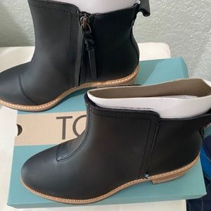 Tom’s brand new Marina black booties.